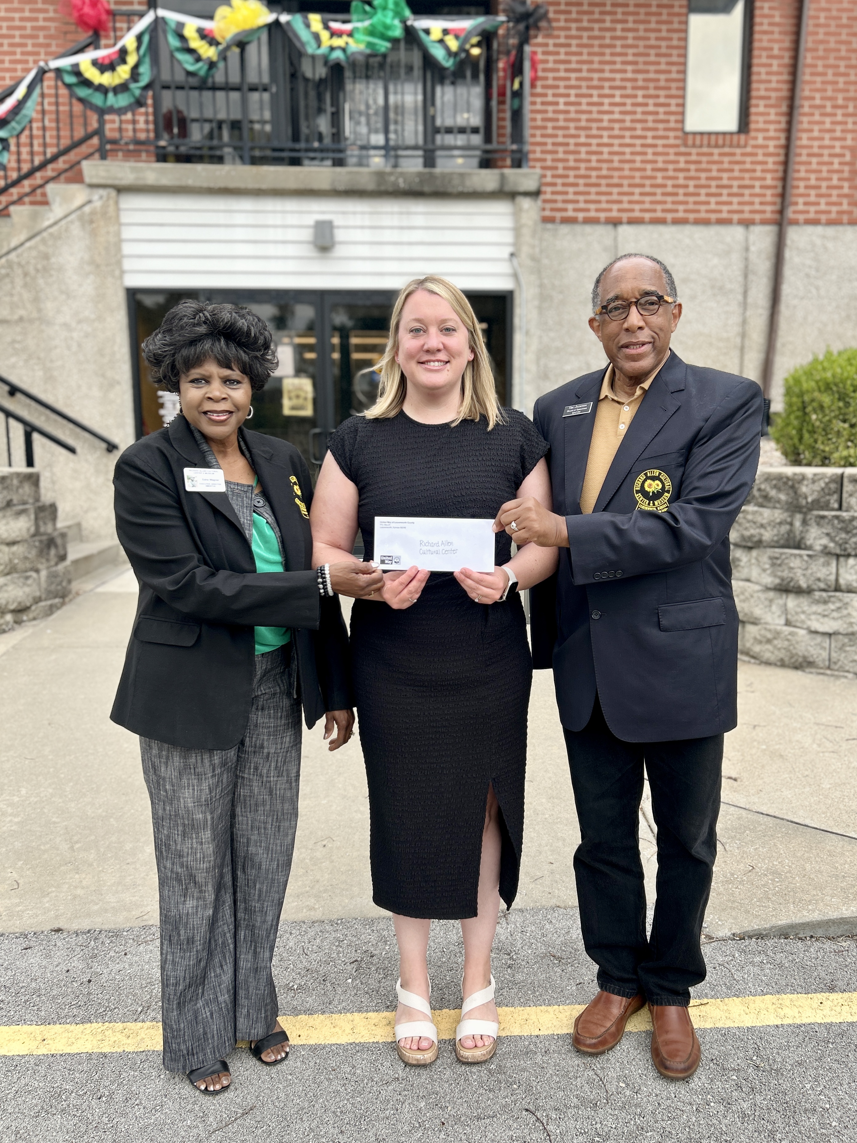 Presenting check at Richard Allen Cultural Center.